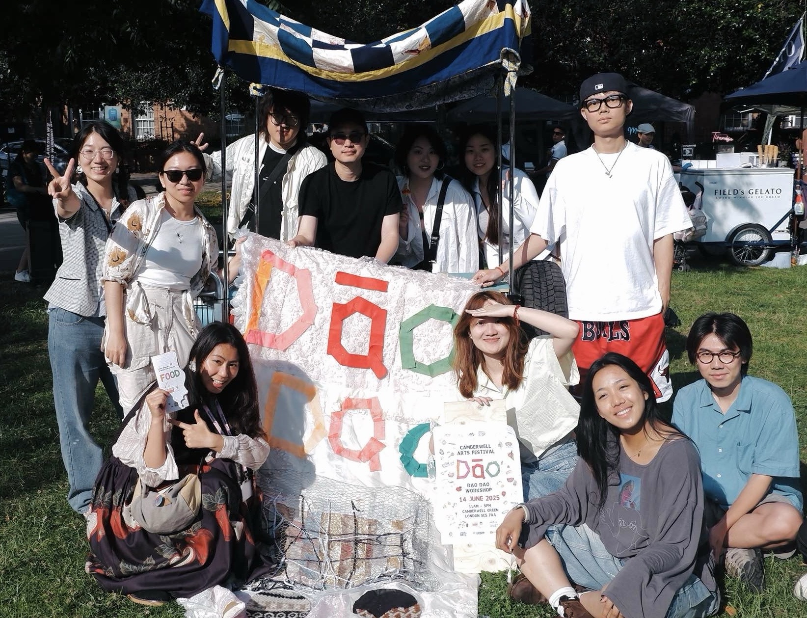 Dāo Dao workshop table with food, fieldwork materials, and community storytelling process