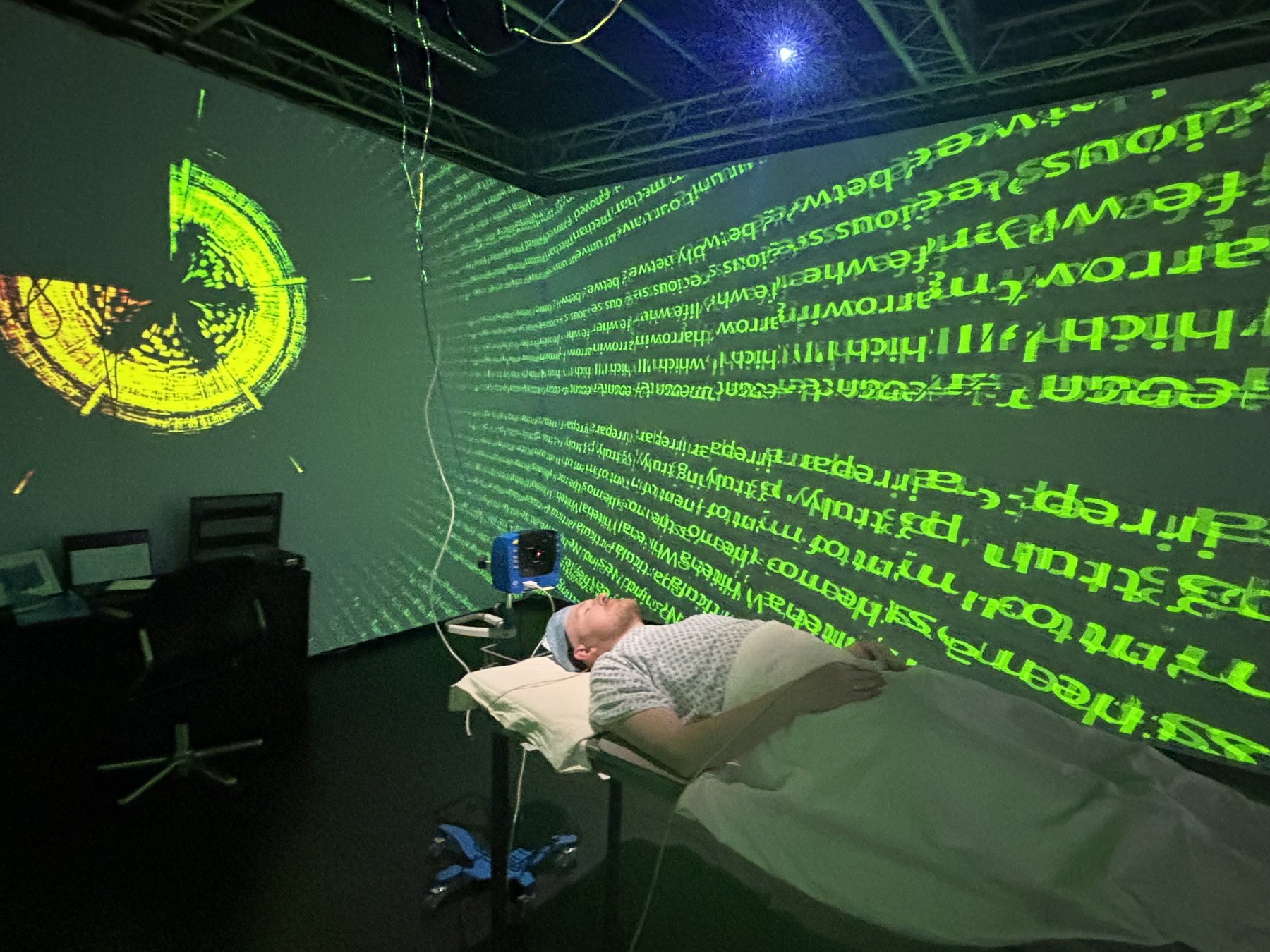 Wide projection and installation view from What We Leave Behind